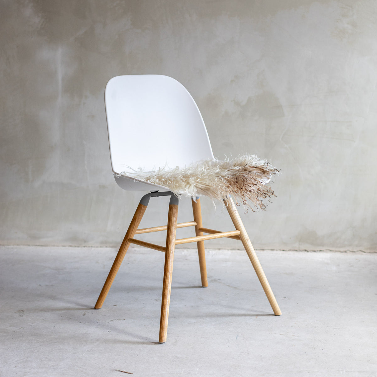 Coussin de chaise rond peau de mouton bouclée naturelle