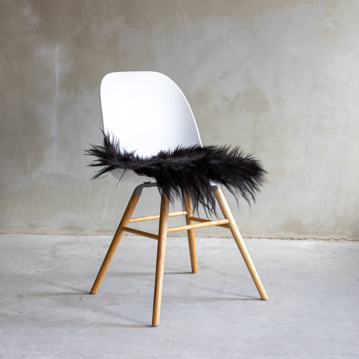 Coussin de chaise peau de mouton islandaise noir