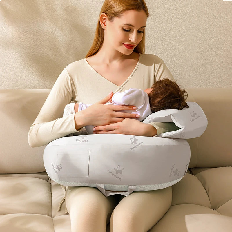 Coussin d'allaitement avec un support de bras